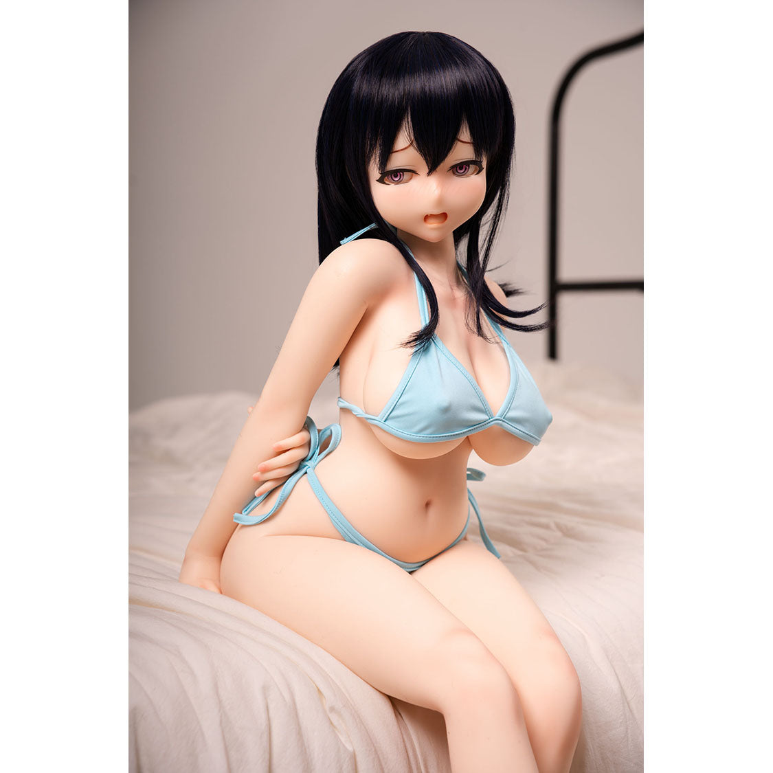 3ft 1in or 95cm tall mini Anime style silicone sex doll with large breasts, black hair and pink eyes in a blue bikini.  Made by Irokebijin.