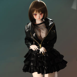 2ft 60cm mini anime sex doll Zella. Silicone body construction, giant breasts, fair skin, short dark hair and a curvy body in a  sheer top, black leather jacket and black skirt.