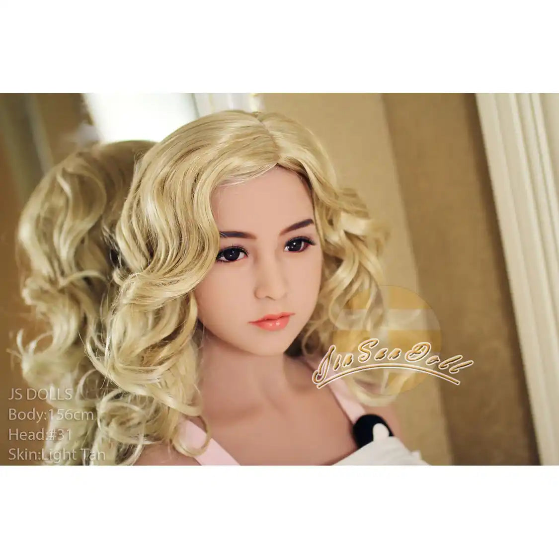 Hot full size 5ft 1in 156cm tall TPE sex doll with C cup breasts and long blonde wavy hair. By JS Doll.