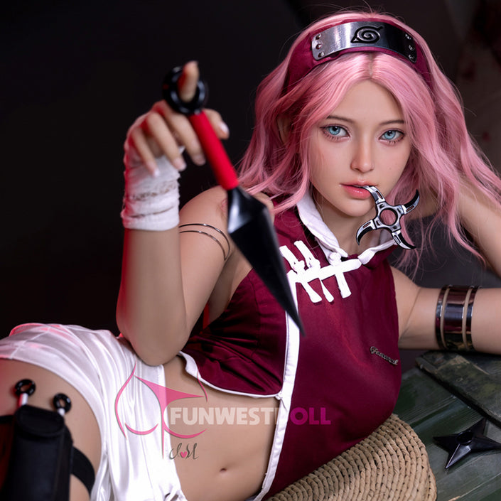 5ft 3in 159cm full size white female TPE sex doll with pink hair, A-cup breasts and a slim athletic figure in a cute ninja costume.