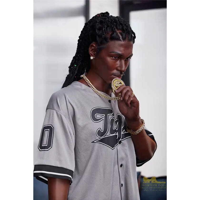 5ft 6in 170cm muscular Black male sex doll with a large penis and dreadlocks in a jersey and shorts.
