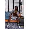 5ft 6in 170cm muscular Black male sex doll with a large penis and dreadlocks in a jersey and shorts.