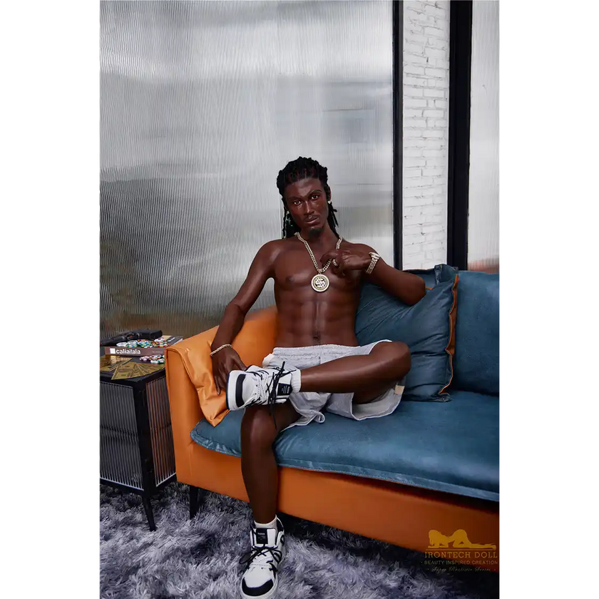 5ft 6in 170cm muscular Black male sex doll with a large penis and dreadlocks in a jersey and shorts.