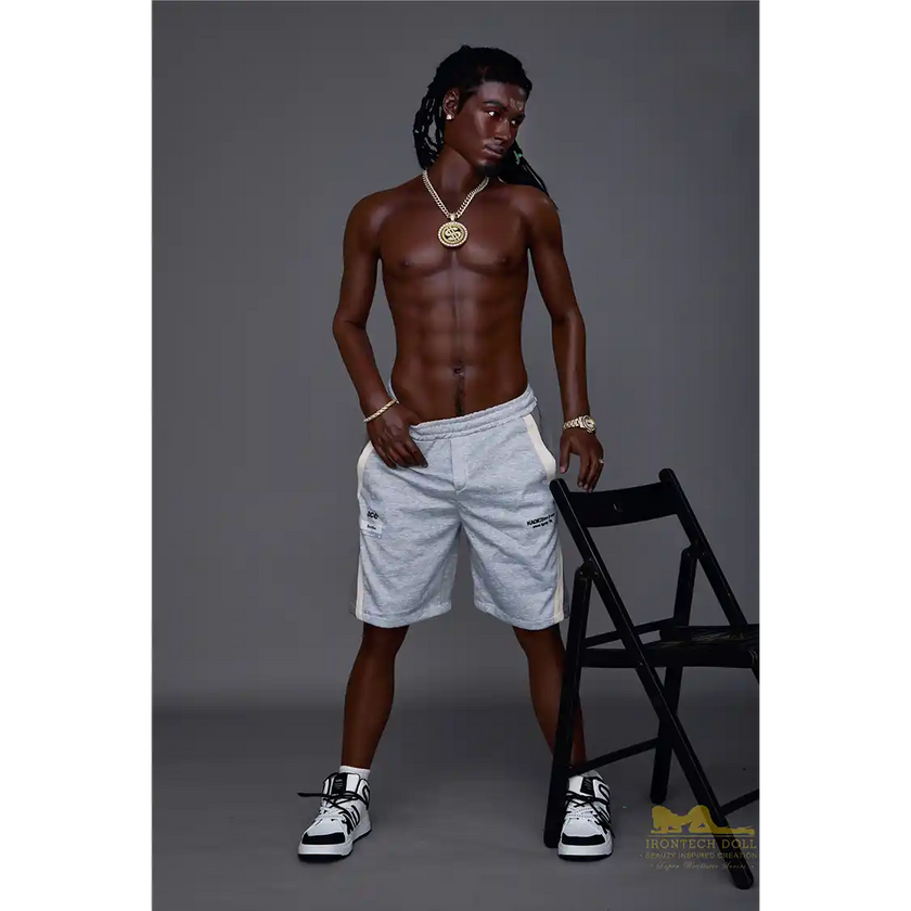 5ft 6in 170cm muscular Black male sex doll with a large penis and dreadlocks in a jersey and shorts.