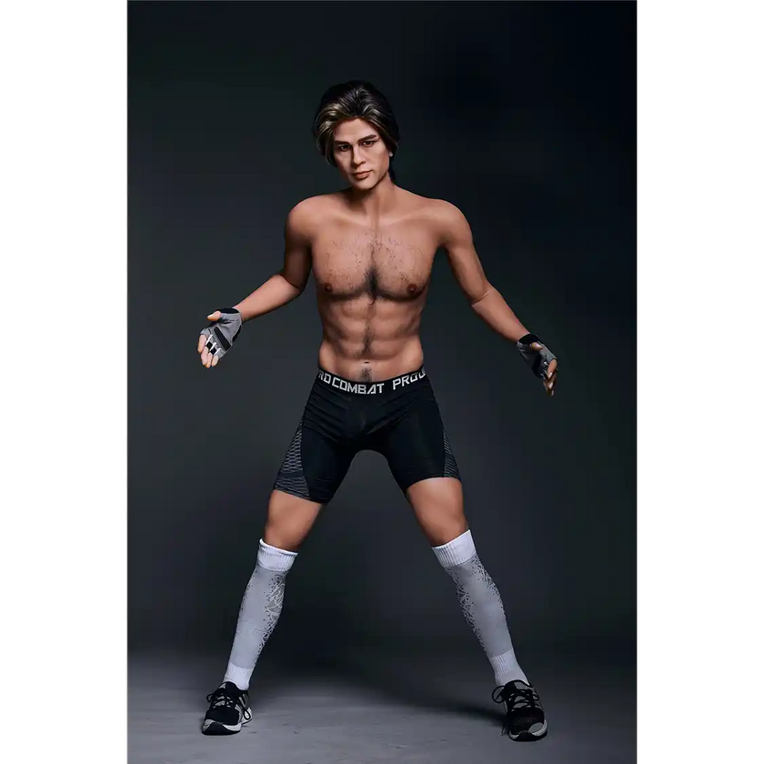 5ft 9in 175cm muscular Asian male sex doll with blonde hair, and a large penis dressed in a soccer outfit.