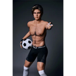 5ft 9in 175cm muscular Asian male sex doll with blonde hair, and a large penis dressed in a soccer outfit.