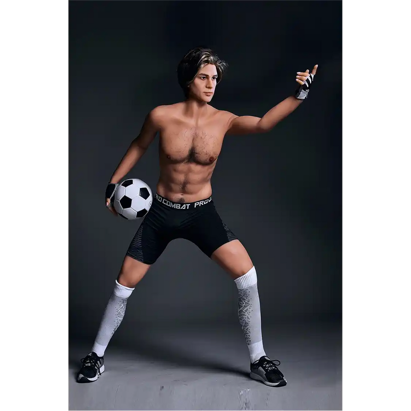 5ft 9in 175cm muscular Asian male sex doll with blonde hair, and a large penis dressed in a soccer outfit.