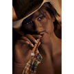 5ft 9in 175cm muscular dark skinned Asian male sex doll with dark hair, and a large penis dressed in a cowboy outfit.