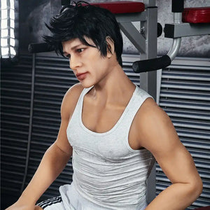 5ft 4in 162cm muscular Asian male sex doll with dark hair and a large penis in a tank top and shorts.