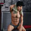 5ft 4in 162cm muscular Asian male sex doll with dark hair and a large penis in a tank top and shorts.