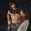 5ft 4in 162cm muscular White DILF sex doll with shaggy dark hair, stubble and a large penis in a gladiator outfit.