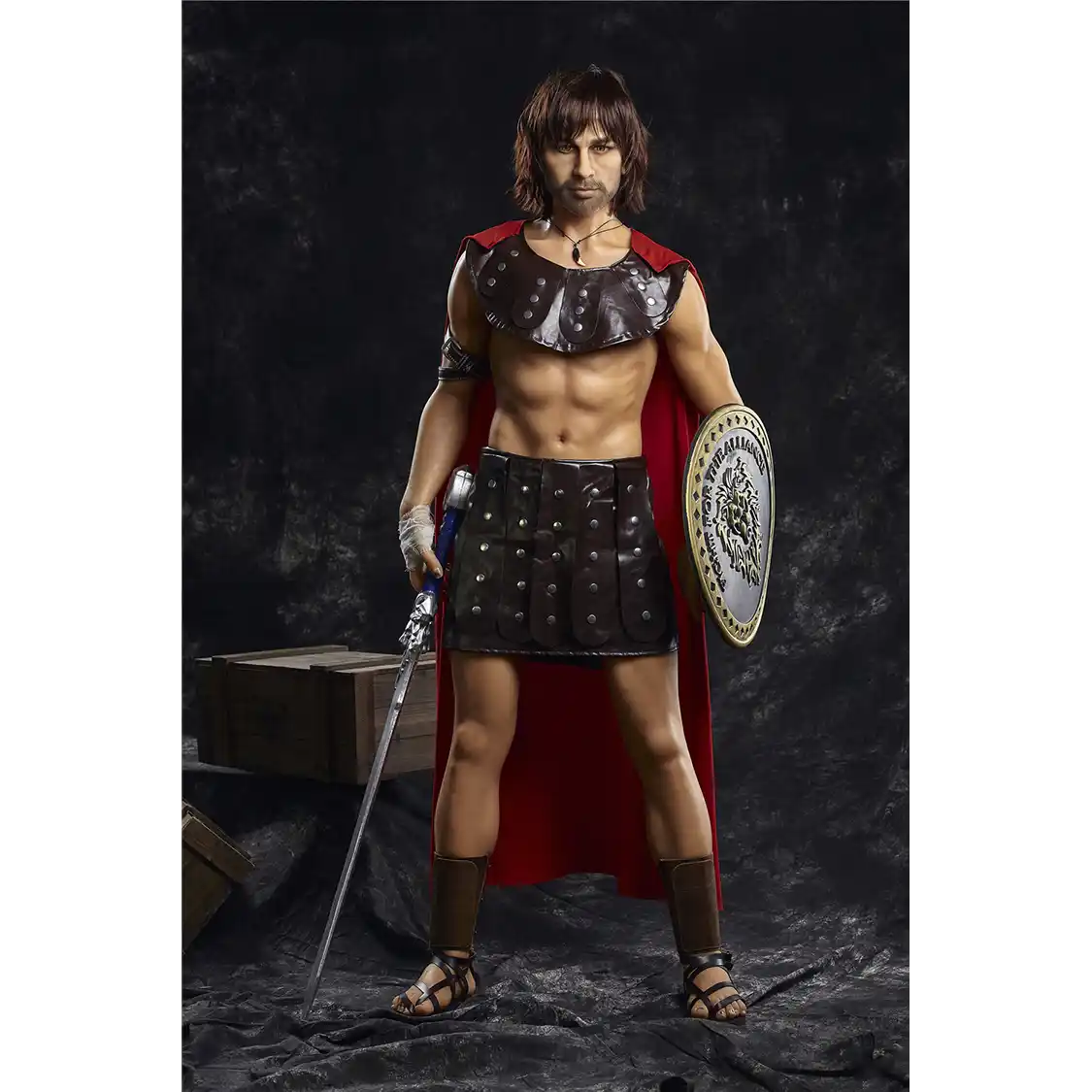 5ft 4in 162cm muscular White DILF sex doll with shaggy dark hair, stubble and a large penis in a gladiator outfit.