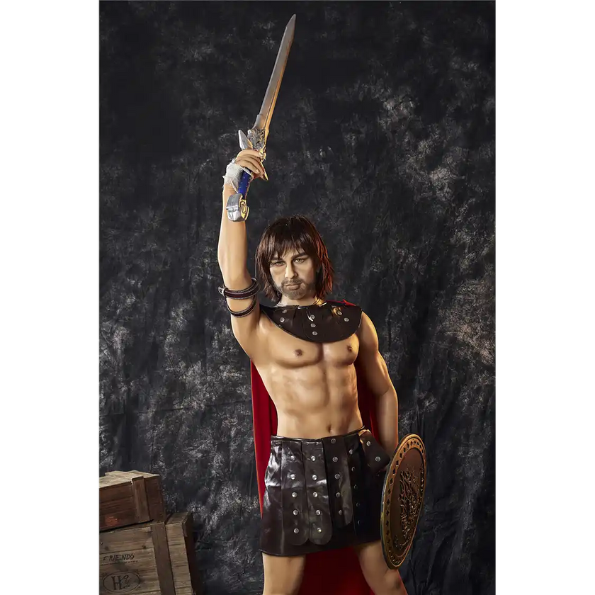 5ft 4in 162cm muscular White DILF sex doll with shaggy dark hair, stubble and a large penis in a gladiator outfit.