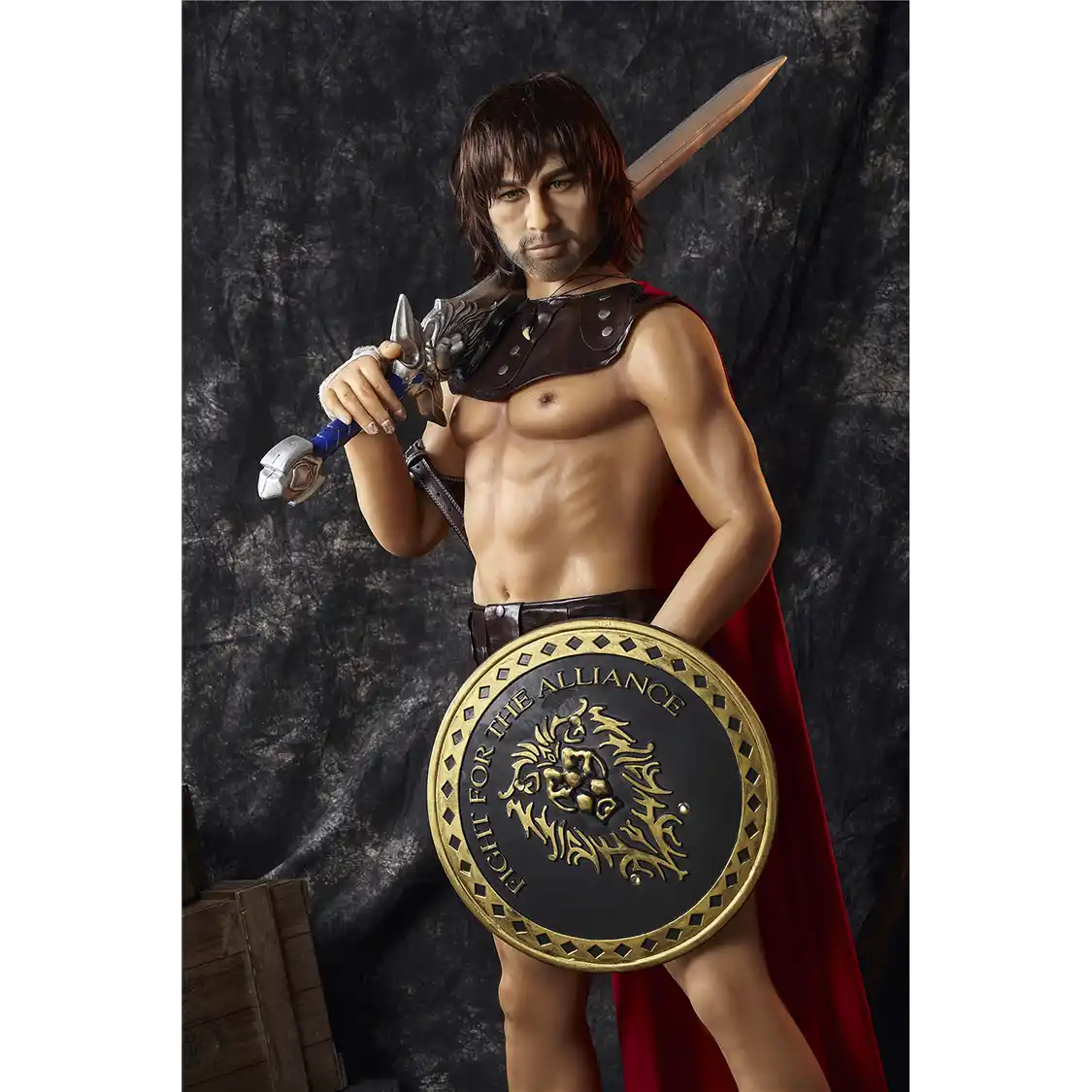 5ft 4in 162cm muscular White DILF sex doll with shaggy dark hair, stubble and a large penis in a gladiator outfit.