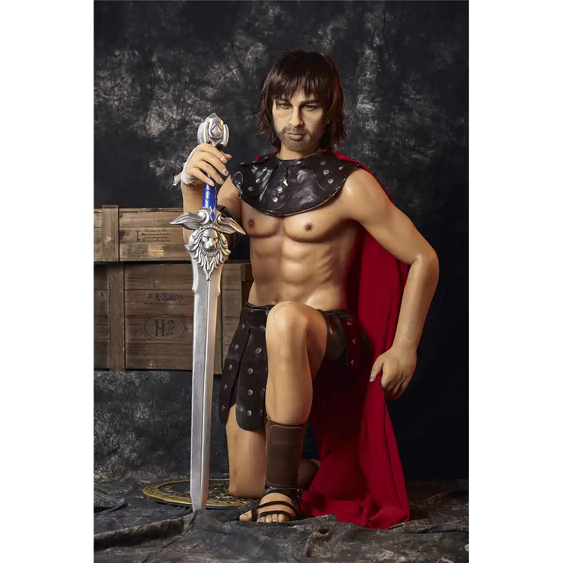 5ft 4in 162cm muscular White DILF sex doll with shaggy dark hair, stubble and a large penis in a gladiator outfit.