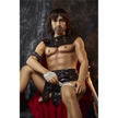 5ft 4in 162cm muscular White DILF sex doll with shaggy dark hair, stubble and a large penis in a gladiator outfit.