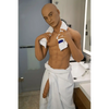 5ft 7in 170cm muscular Black male sex doll with abs, giant penis and blonde hair and blue eyes in gray underwear made by Doll Forever.