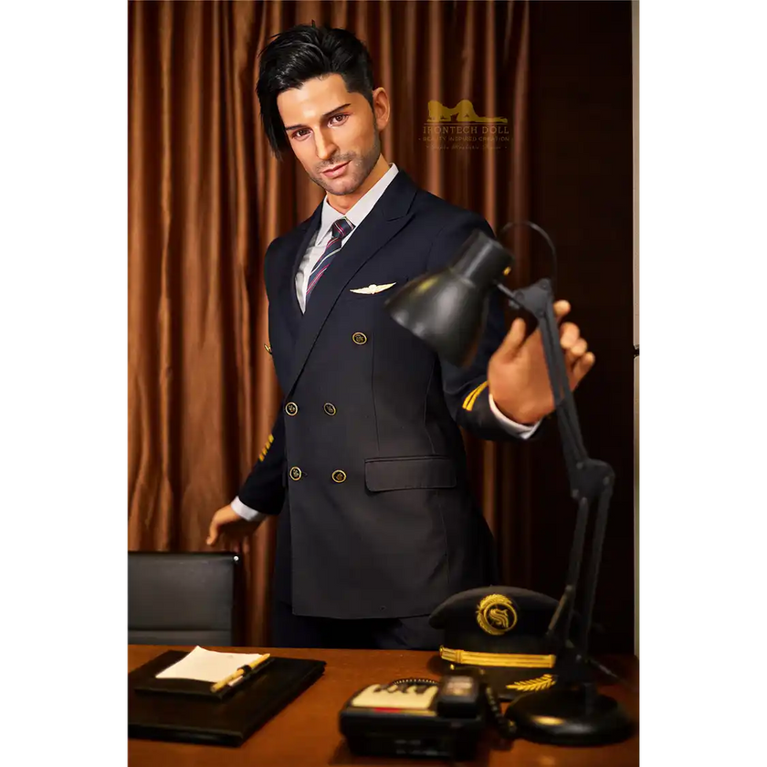 5ft 9in 176cm muscular White male sex doll with a large penis in a pilots outfit.