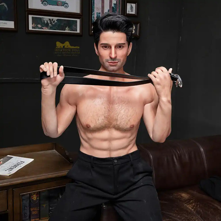 5ft 9in 176cm muscular White male sex doll with a large penis in black dress clothes and a coat.