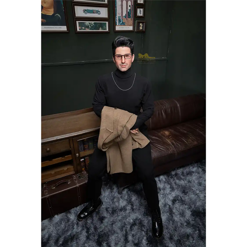 5ft 9in 176cm muscular White male sex doll with a large penis in black dress clothes and a coat.