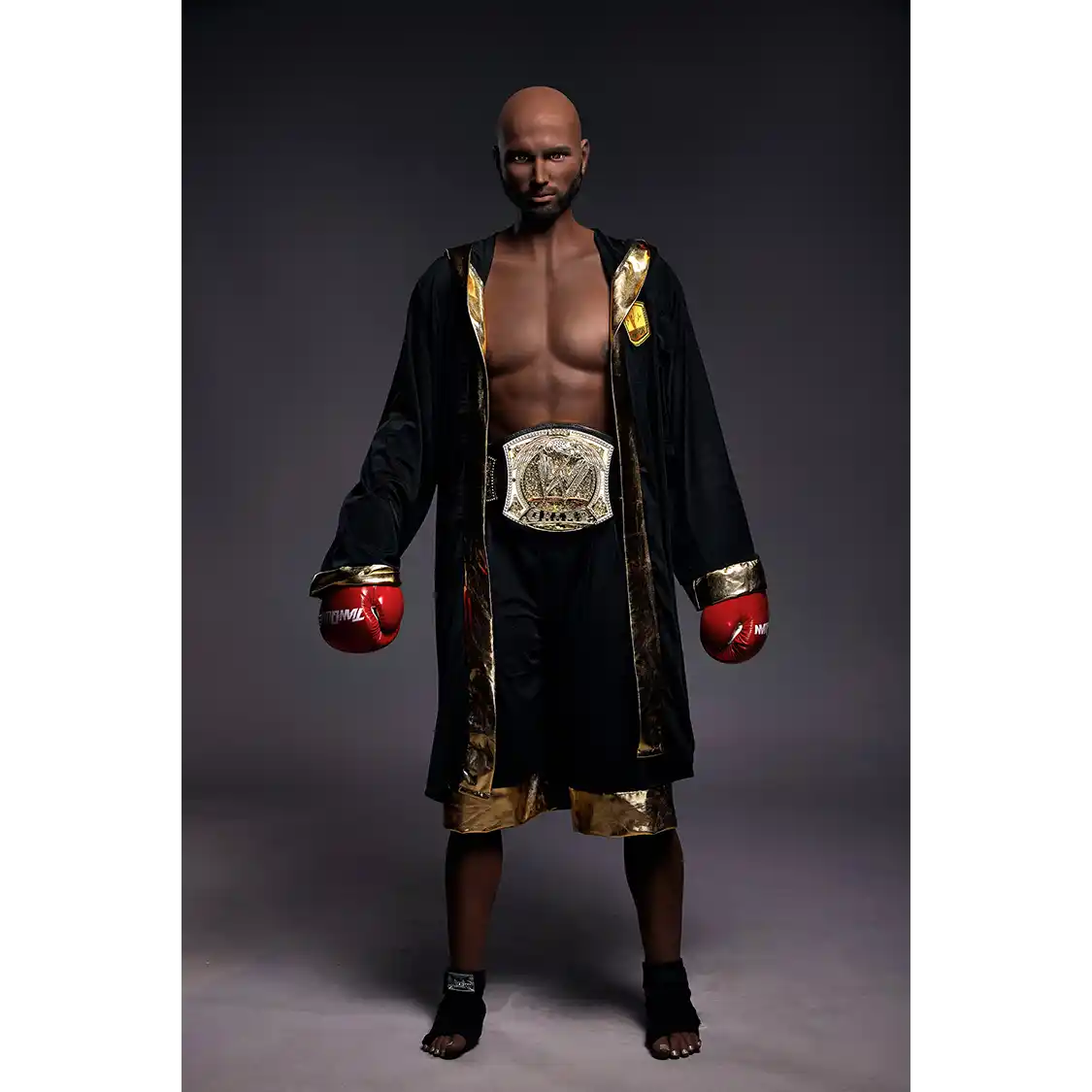 5ft 9in 175cm muscular Black male sex doll bald with a large penis dressed in a boxing outfit.