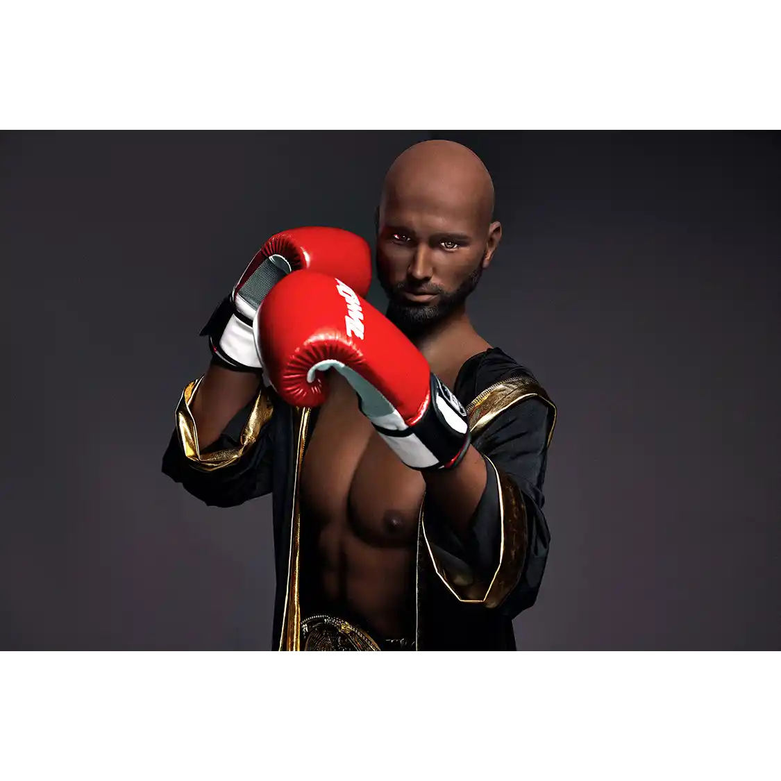 5ft 9in 175cm muscular Black male sex doll bald with a large penis dressed in a boxing outfit.