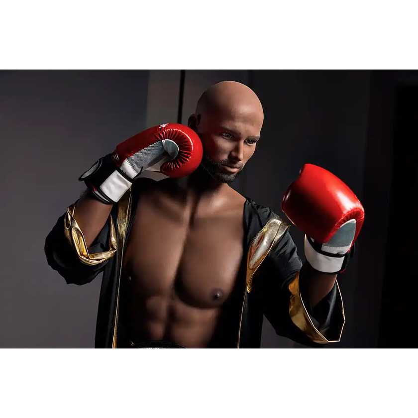 5ft 9in 175cm muscular Black male sex doll bald with a large penis dressed in a boxing outfit.
