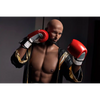 5ft 9in 175cm muscular Black male sex doll bald with a large penis dressed in a boxing outfit.