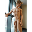 5ft 7in 170cm muscular white male sex doll with abs, giant penis and blonde hair and blue eyes in white underwear made by Doll Forever.