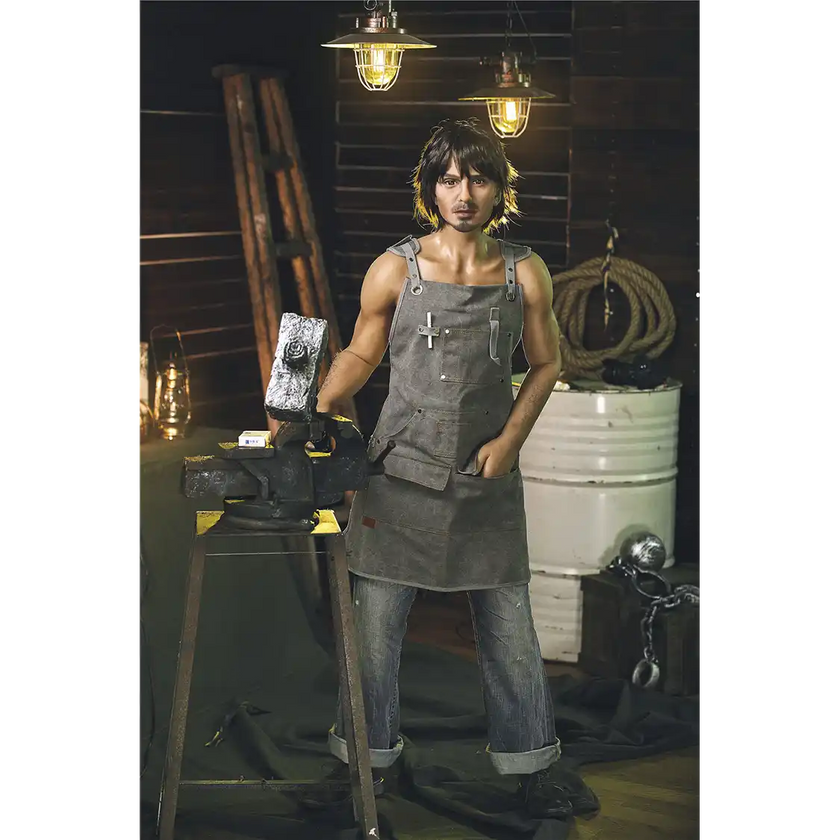 5ft 4in 162cm muscular White male sex doll with dark hair and a large penis in a blacksmiths outfit.