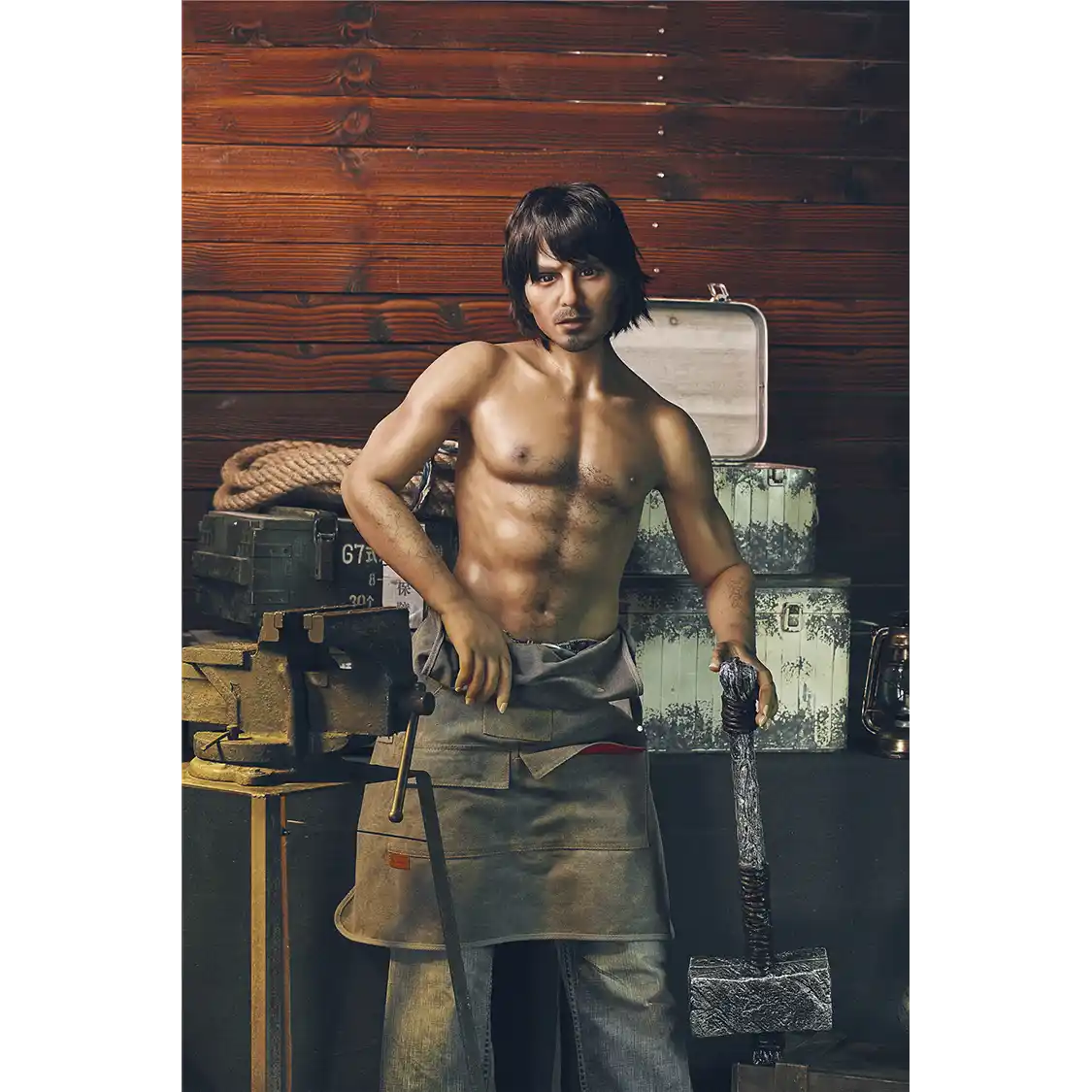 5ft 4in 162cm muscular White male sex doll with dark hair and a large penis in a blacksmiths outfit.