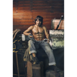 5ft 4in 162cm muscular White male sex doll with dark hair and a large penis in a blacksmiths outfit.