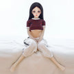 Christina, 60cm anime style mini sex doll with black hair and medium breasts.  Made by SY Doll.  