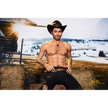 5ft 6in or 170cm silicone male sex doll with muscular arms, chest and abs with short brown hair and blue eyes in a cowboy outfit.