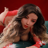 5ft 2in 158cm white female tpe sex doll with long wavy blonde hair, large breasts, and slim curvy figure in red lingerie.