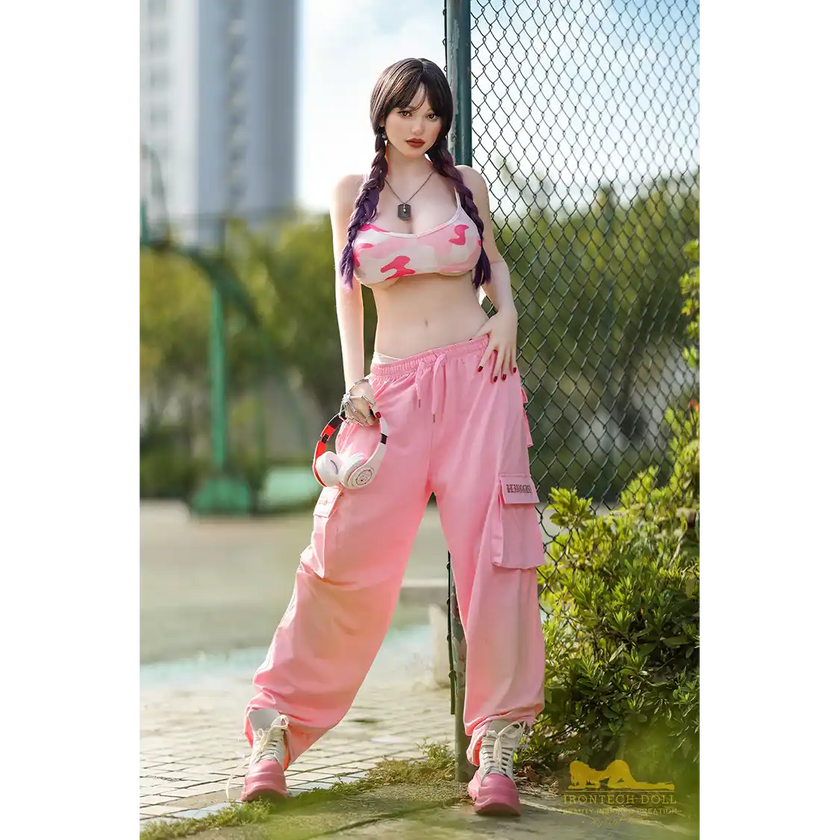 5ft 4in or 163cm curvy white female hybrid sex doll with long legs, long dark hair, large breasts, large butt, and brown eyes in a pink top and pink exercise pants.