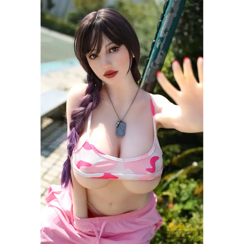 5ft 4in or 163cm curvy white female hybrid sex doll with long legs, long dark hair, large breasts, large butt, and brown eyes in a pink top and pink exercise pants.