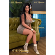 5ft 2in 157cm sex doll with long straight black hair, tan skin, and large E-cup breasts in short tight champaigne dress.Made by 6ye.