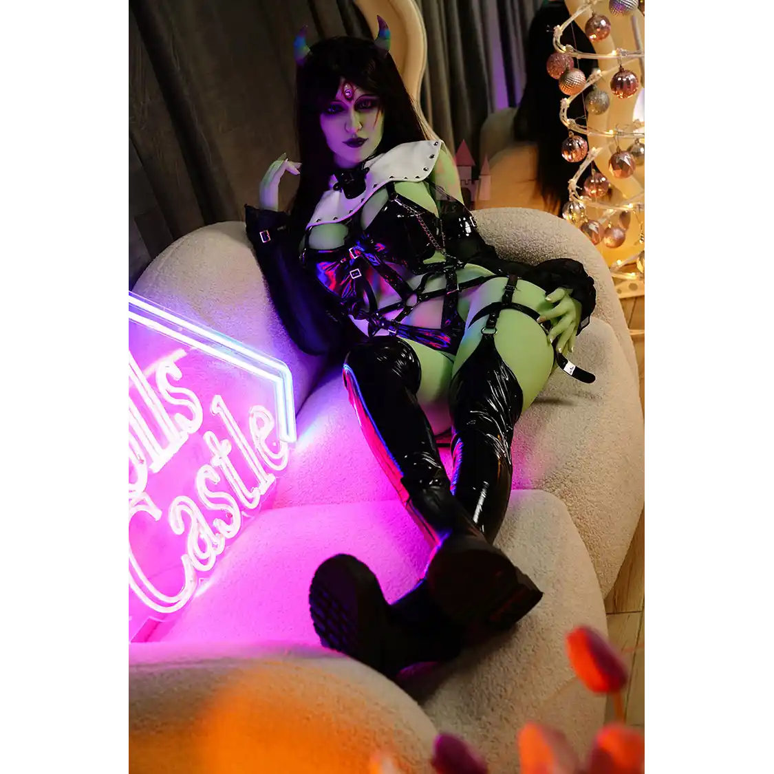 5ft 6in 168cm tall green alien TPE sex doll with large E-cup breasts, blue eyes and long black hair in a black sci-fi outfit.