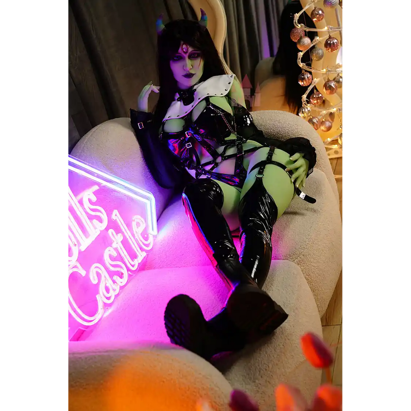 5ft 6in 168cm tall green alien TPE sex doll with large E-cup breasts, blue eyes and long black hair in a black sci-fi outfit.