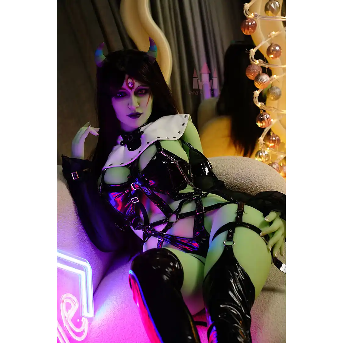 5ft 6in 168cm tall green alien TPE sex doll with large E-cup breasts, blue eyes and long black hair in a black sci-fi outfit.