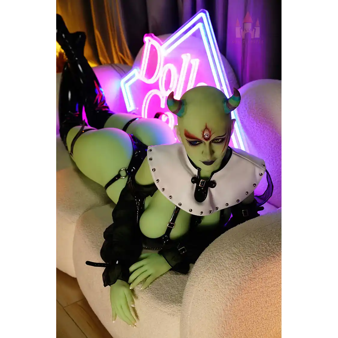 5ft 6in 168cm tall green alien TPE sex doll with large E-cup breasts, blue eyes and long black hair in a black sci-fi outfit.