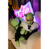 5ft 6in 168cm tall green alien TPE sex doll with large E-cup breasts, blue eyes and long black hair in a black sci-fi outfit.