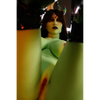 5ft 6in 168cm tall green alien TPE sex doll with large E-cup breasts, blue eyes and long black hair in a black sci-fi outfit.