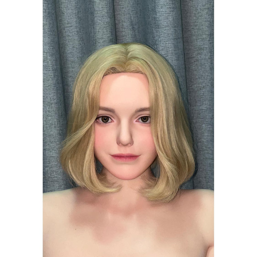 5ft 7in or 170cm life size curvy real female silicone sex doll with curly blonde hair, brown eyes and C-cup breasts with very light skin.  Made by Zelex.