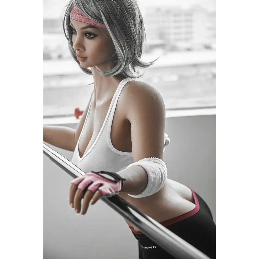 5ft 2in 158cm curvy Asian TPE sex doll with silver hair, large I cup breasts brown eyes and tanned skin in sports bra and tight pants.