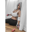 5ft 2in 158cm curvy Asian TPE sex doll with silver hair, large I cup breasts brown eyes and tanned skin in sports bra and tight pants.