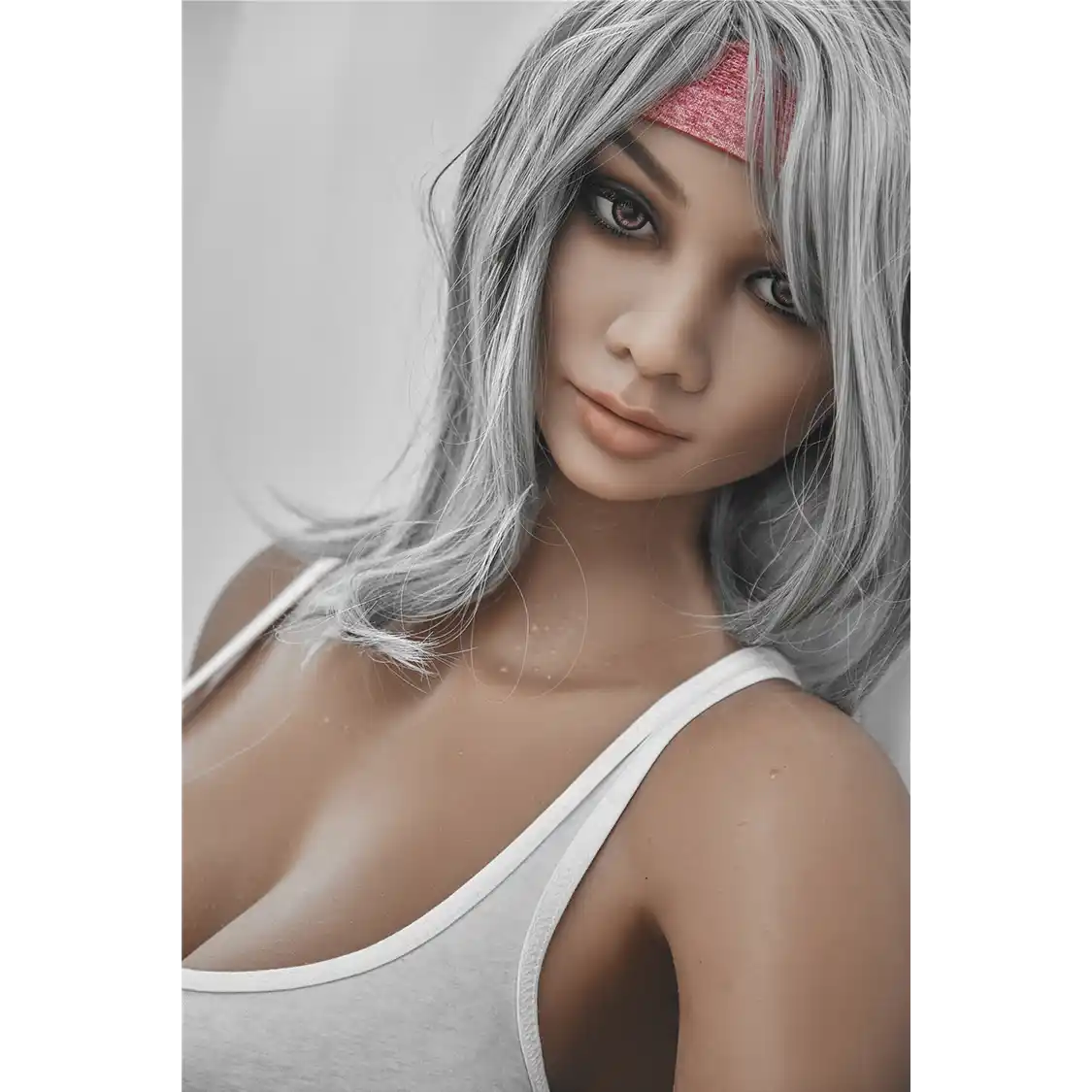 5ft 2in 158cm curvy Asian TPE sex doll with silver hair, large I cup breasts brown eyes and tanned skin in sports bra and tight pants.