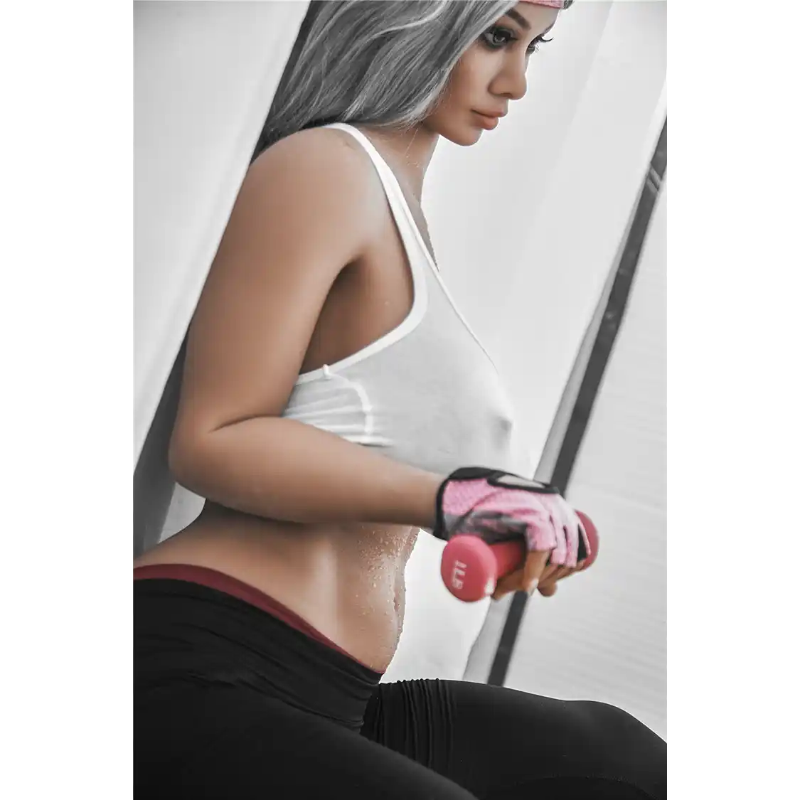 5ft 2in 158cm curvy Asian TPE sex doll with silver hair, large I cup breasts brown eyes and tanned skin in sports bra and tight pants.