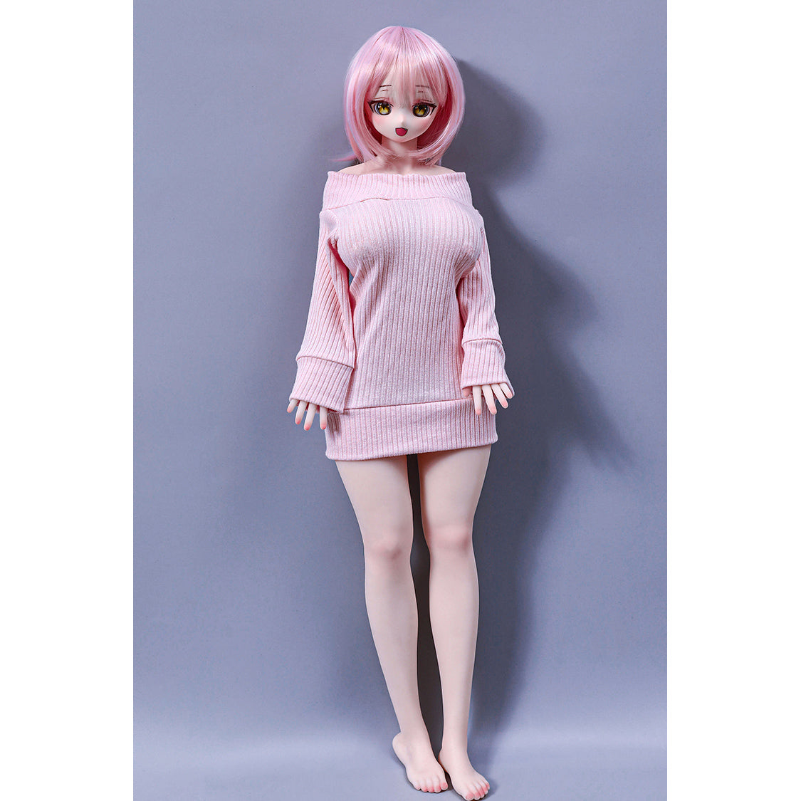 2ft 60cm mini anime sex doll Azami. Silicone body construction, giant breasts, fair skin, pink hair and a sexy curvy body in a pink blouse.